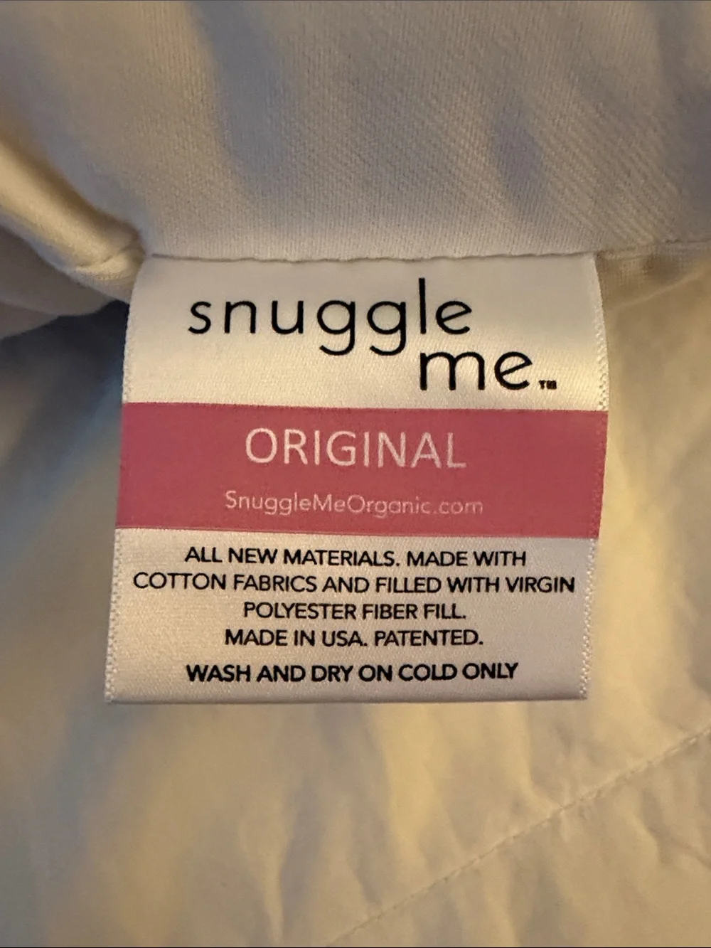 Snuggle Me patented sensory lounger pillow to hug your baby